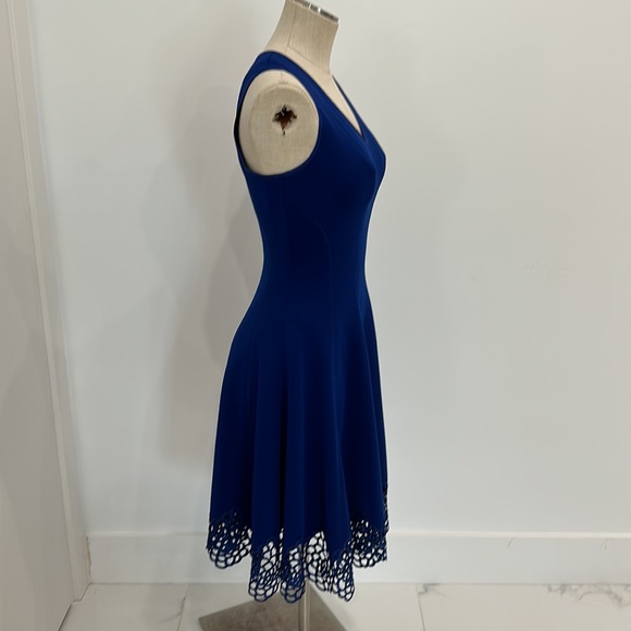 Classic style combines with modern, edge trend for a dress that is flattering. - Picture 4 of 8